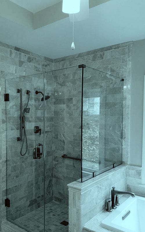 Frameless shower door installed by A and E Glass Repair